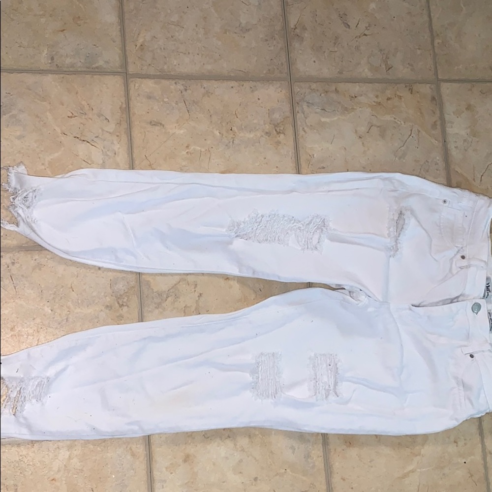 Ripped Mid Rise Jeans